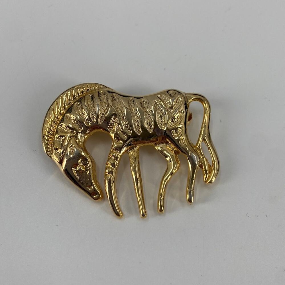 Vintage goldtone zebra brooch